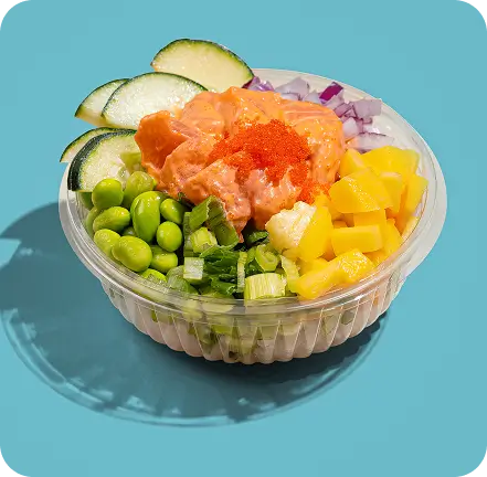 Poke Bowl with salmon, edamame, mango, cucumbers, and fresh toppings, ideal for a flavorful Wall Street lunch.