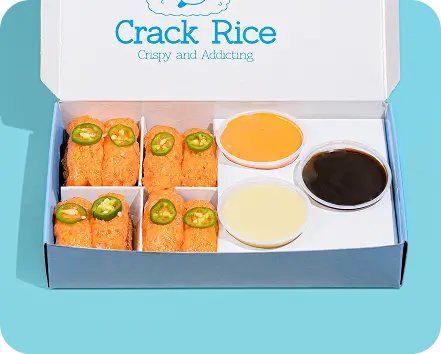 Spicy Shrimp Crack Rice with dipping sauces, featuring crispy fried sushi rice topped with jalapeños and spicy seasoning.