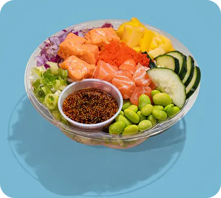 Fresh poke bowl with salmon, edamame, mango, cucumber, and vibrant toppings, Midtown restaurant's signature dish.