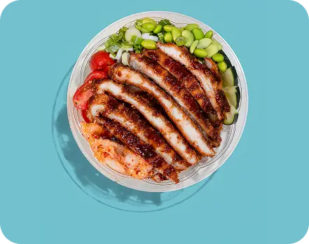 Crispy chicken poke bowl with fresh veggies at Long Island City's Poke Bowl restaurant.