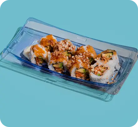 Spicy Tuna Crunchy Roll with avocado and tempura flakes, drizzled with teriyaki and spicy mayo, served in Midtown.