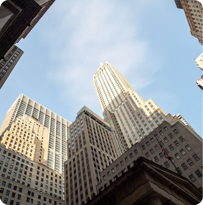 Tall skyscrapers towering in Wall Street area, capturing the dynamic urban skyline.