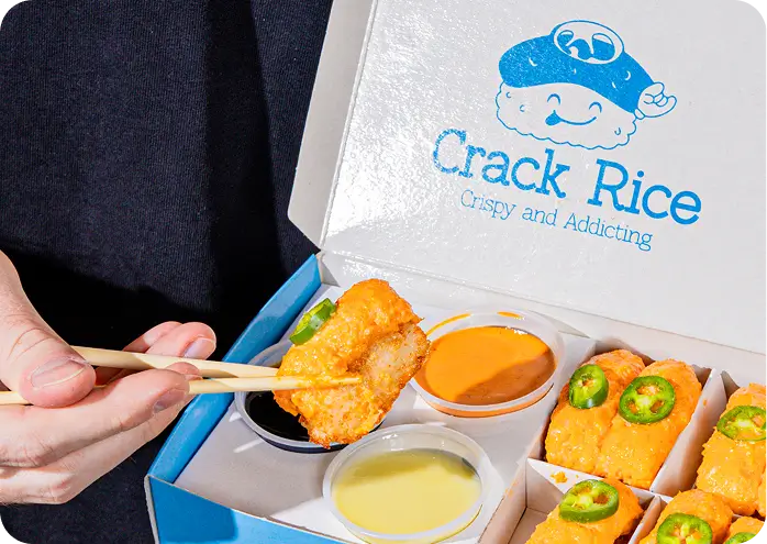 Crispy rice snacks with dipping sauces at Jersey City poke bowl restaurant.
