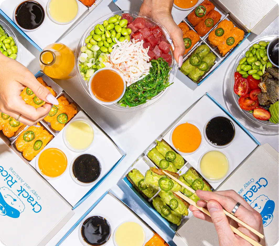 Catering spread of vibrant poke bowls and sushi for corporate events at Poke Bowl NY. Order for groups of 10+.