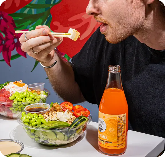 Fresh vegan poke bowl with seasoned tofu and vegetables, enjoyed at World Trade Center eatery.