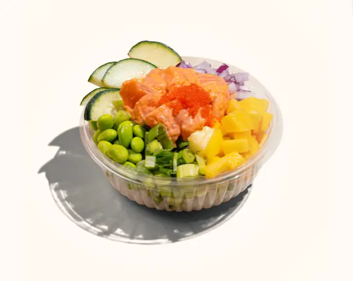 Fresh poke bowl with salmon, edamame, cucumber, and mango at Poke Bowl NY. Customize your culinary experience.
